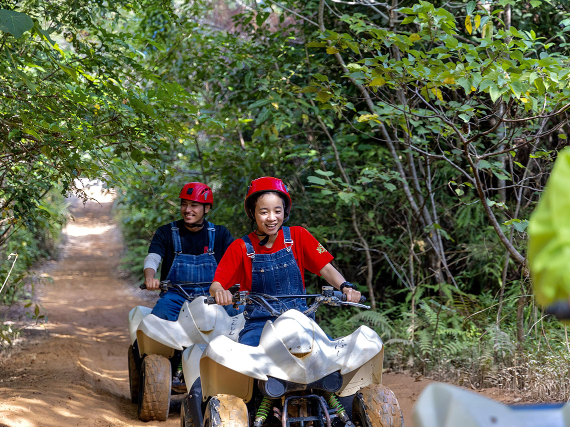 a young girl on an ATV